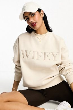 Six Stories wifey statement jumper in champagne